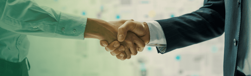 Two people shaking hands.